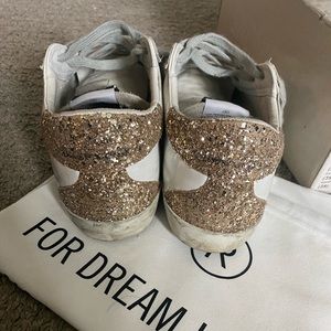 Golden goose gold and silver super star sneaker